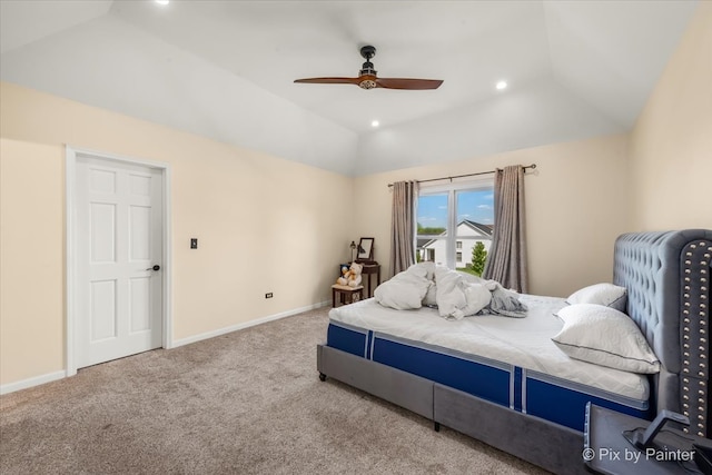 bedroom with carpet, ceiling fan, and lofted ceiling