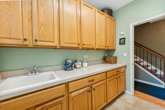 laundry area featuring a sink