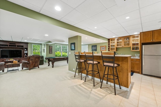 indoor wet bar with freestanding refrigerator, billiards, recessed lighting, and a paneled ceiling