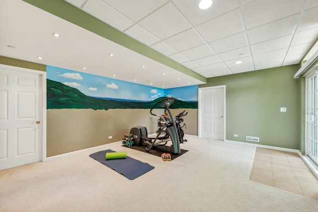 exercise room with carpet flooring, baseboards, and recessed lighting