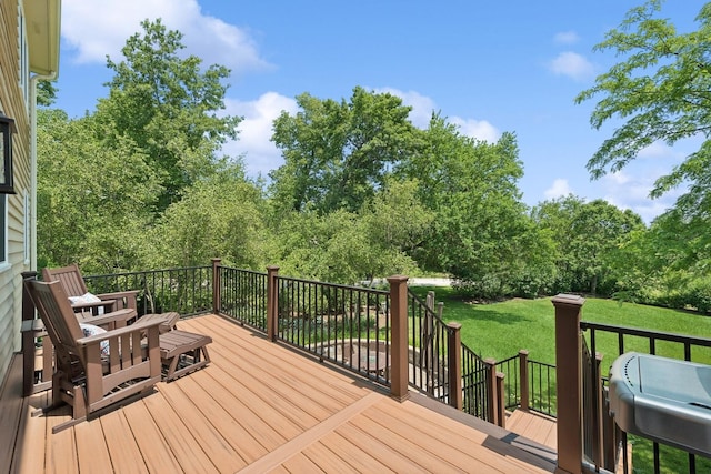 wooden deck with a yard