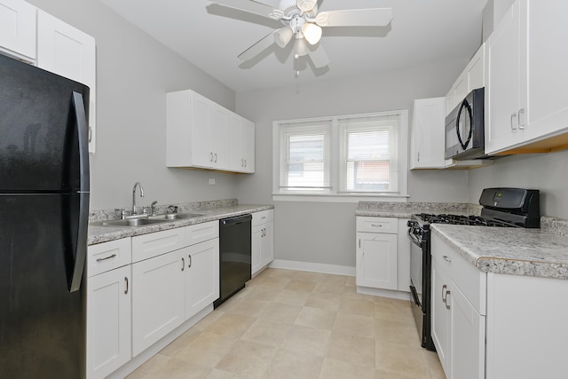 kitchen featuring white cabinets, black appliances, sink, and ceiling fan