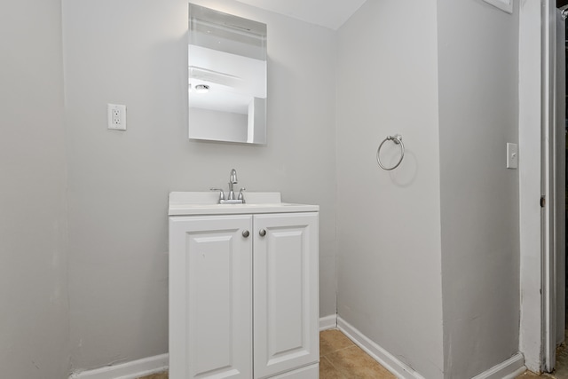 bathroom with vanity and tile patterned floors