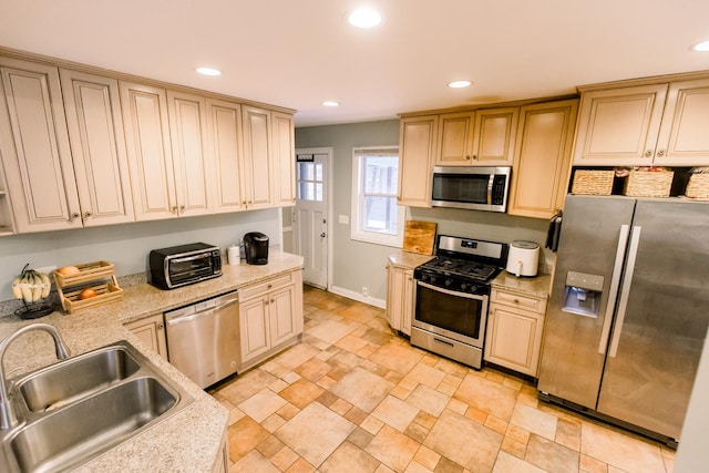 kitchen with stainless steel appliances and sink