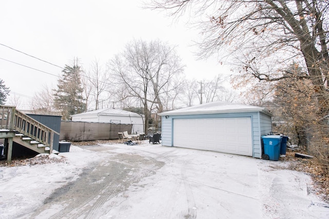 view of snow covered garage