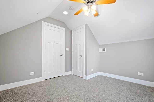 additional living space with carpet, vaulted ceiling, and ceiling fan