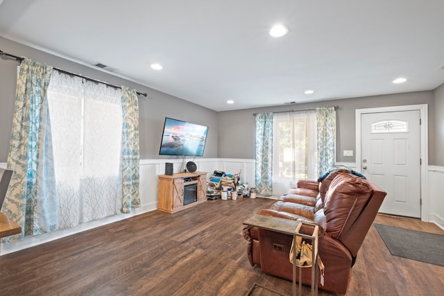 living room featuring dark hardwood / wood-style floors