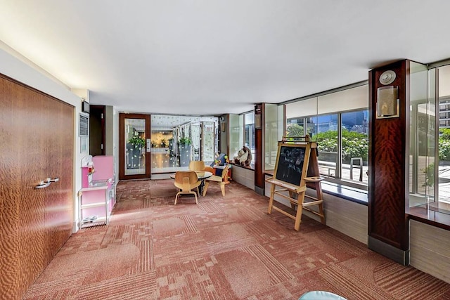 sunroom / solarium featuring a baseboard radiator