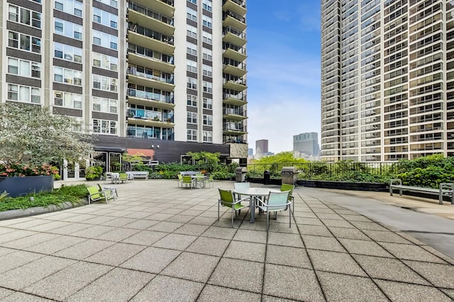 surrounding community featuring a patio