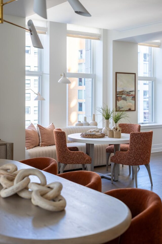 unfurnished dining area featuring hardwood / wood-style flooring and a chandelier