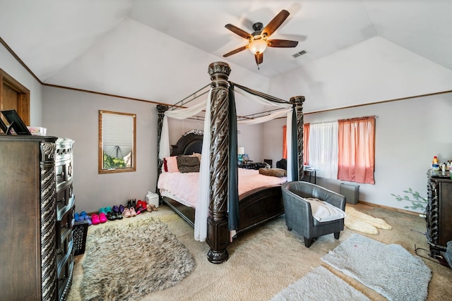 bedroom featuring ceiling fan, carpet floors, and vaulted ceiling