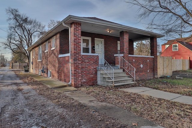 bungalow-style house featuring covered porch