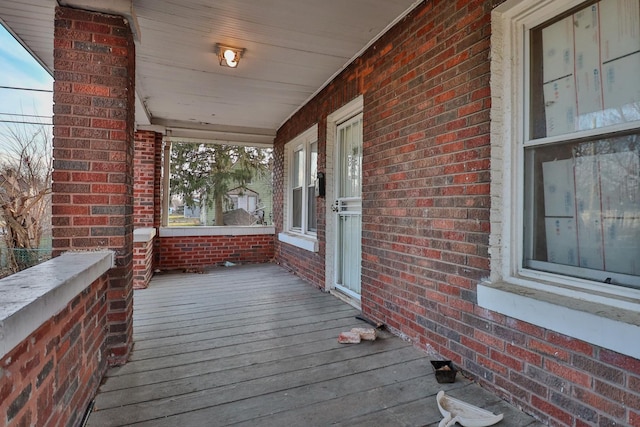 wooden deck with a porch