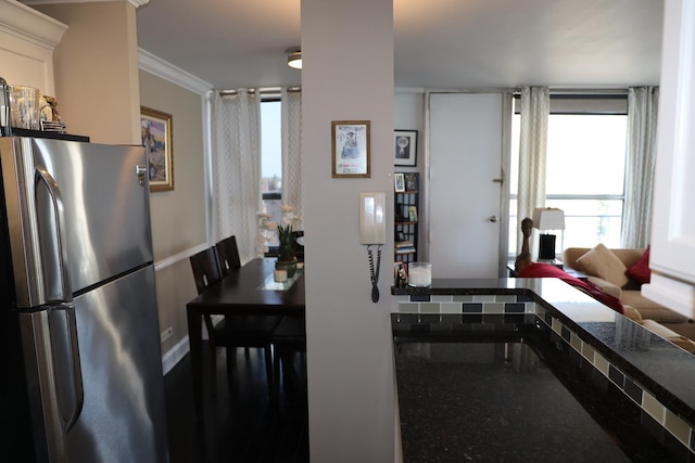 dining area with ornamental molding