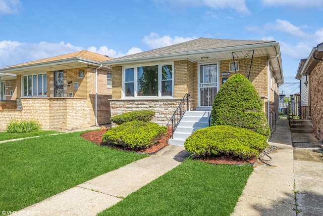 view of front of home with a front yard