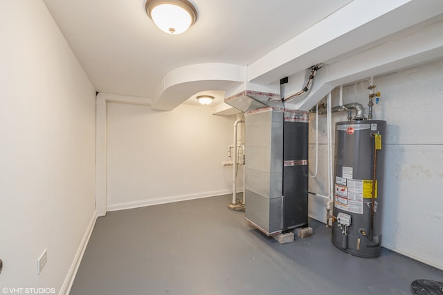 basement with water heater and heating utilities