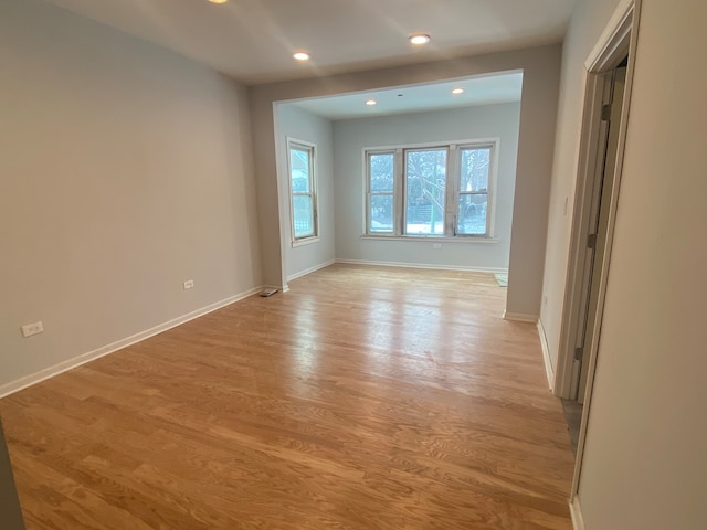 spare room featuring light wood-type flooring