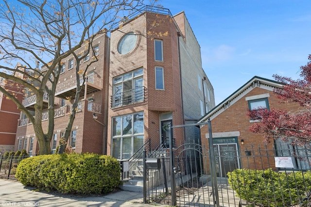 1646 W Augusta Blvd Unit 1, Chicago, IL 60622 - view of front of home featuring brick siding