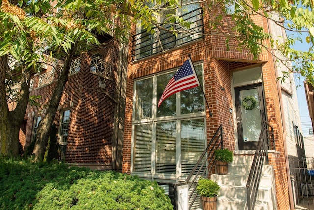 1646 W Augusta Blvd Unit 1, Chicago, IL 60622 - entrance to property with brick siding
