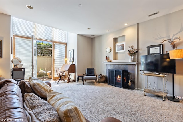 1646 W Augusta Blvd Unit 1, Chicago, IL 60622 - living area with carpet floors, a tiled fireplace, and recessed lighting