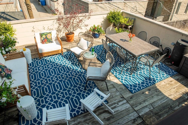 1646 W Augusta Blvd Unit 1, Chicago, IL 60622 - view of wooden balcony featuring outdoor dining area and a deck