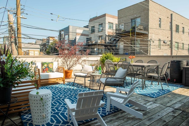 1646 W Augusta Blvd Unit 1, Chicago, IL 60622 - wooden deck with an outdoor hangout area and outdoor dining space