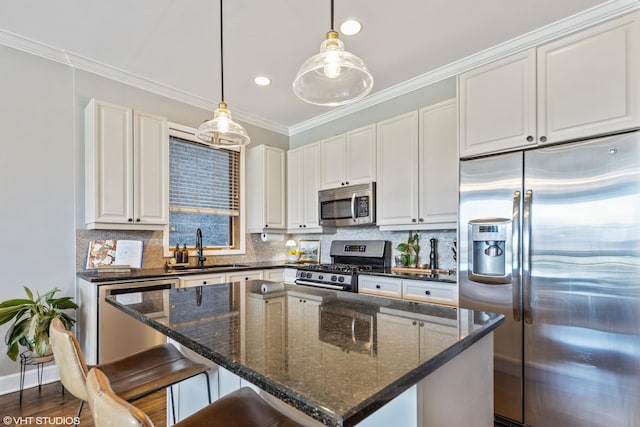 1646 W Augusta Blvd Unit 1, Chicago, IL 60622 - kitchen with stainless steel appliances, a sink, decorative backsplash, pendant lighting, and a kitchen island