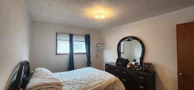 bedroom with a textured ceiling