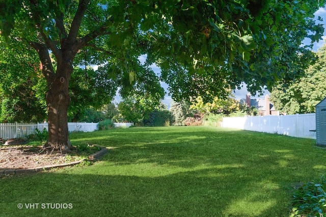 view of yard with fence