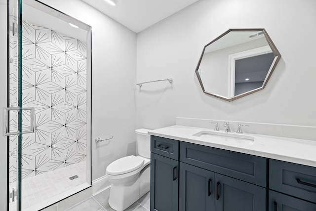 bathroom with a shower stall, tile patterned flooring, visible vents, toilet, and vanity