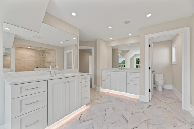 213 Northampton Ln, Lincolnshire, IL 60069 - full bath featuring vanity, a tile shower, marble finish flooring, toilet, and baseboards