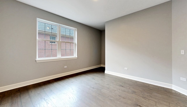 empty room featuring wood-type flooring