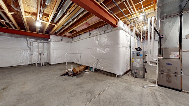 basement featuring heating utilities and water heater