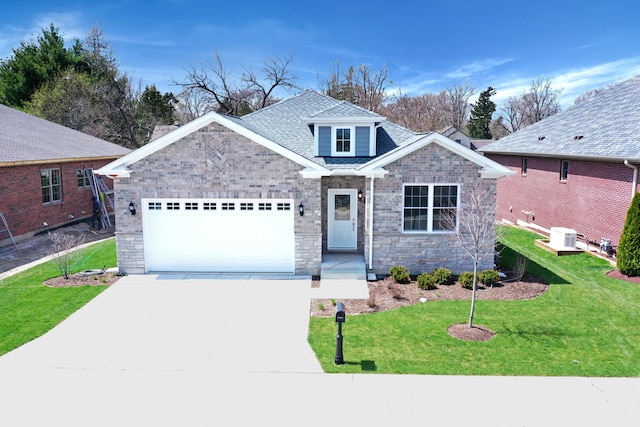 view of front of house featuring a front lawn and a garage