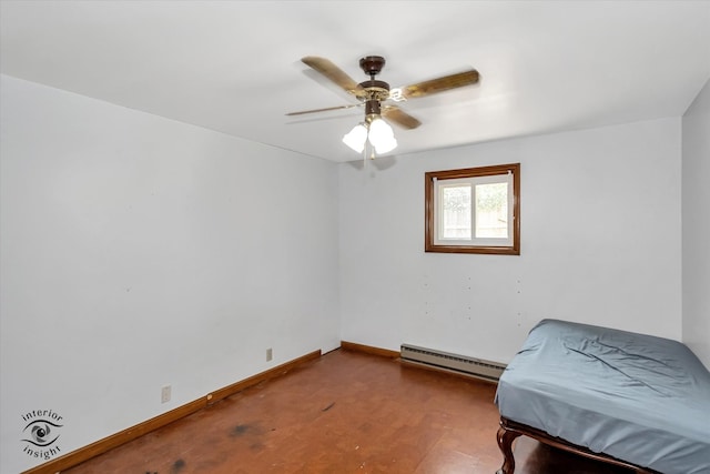 bedroom with a baseboard heating unit and ceiling fan