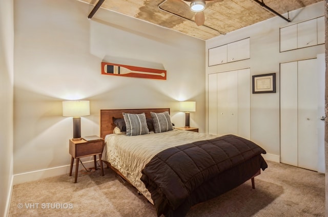 carpeted bedroom with ceiling fan