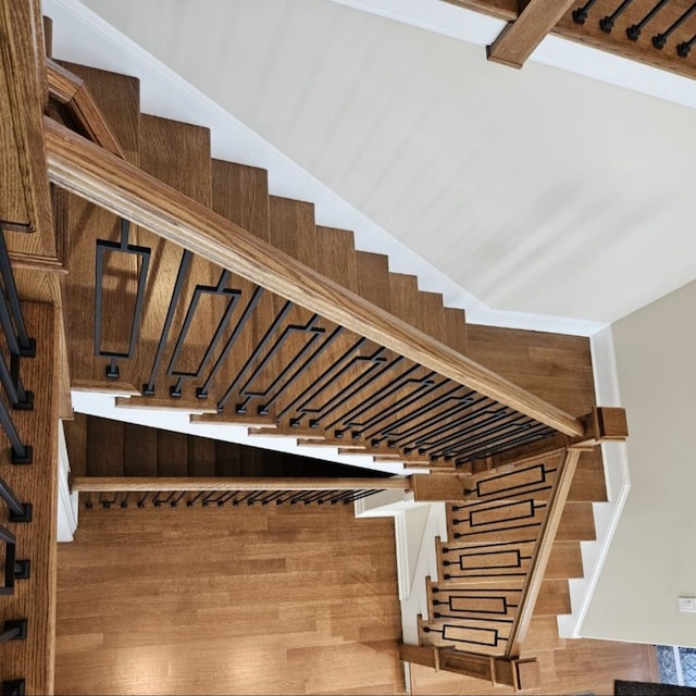 stairs featuring wood-type flooring