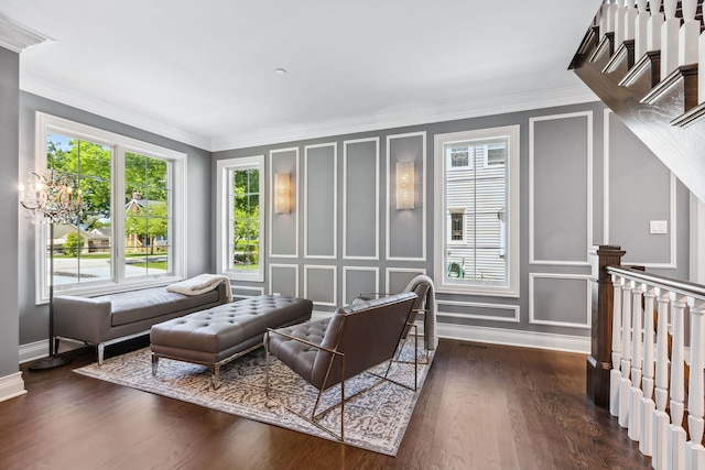 living room with ornamental molding and dark wood-type flooring