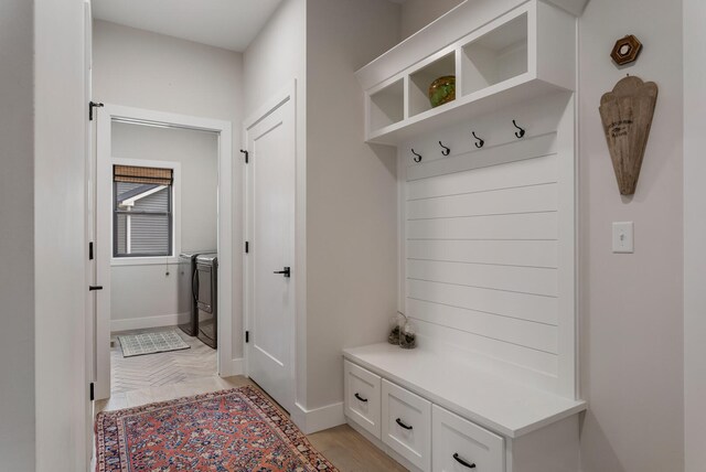 mudroom featuring light parquet flooring