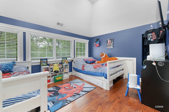 bedroom with wood-type flooring