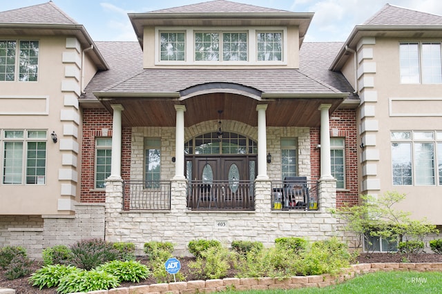 entrance to property with covered porch