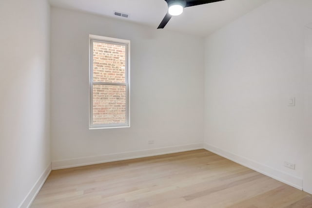 unfurnished room featuring ceiling fan and light wood-type flooring