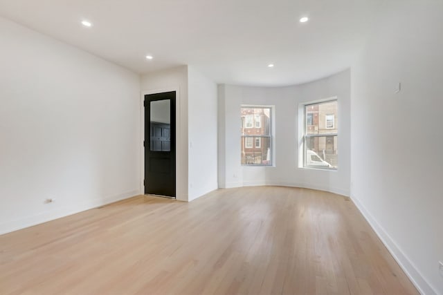 empty room featuring light hardwood / wood-style floors