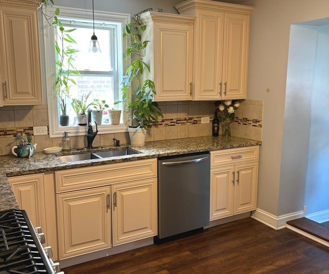 kitchen featuring dark hardwood / wood-style floors, hanging light fixtures, dishwasher, and backsplash