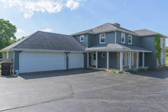 view of front of property featuring a garage