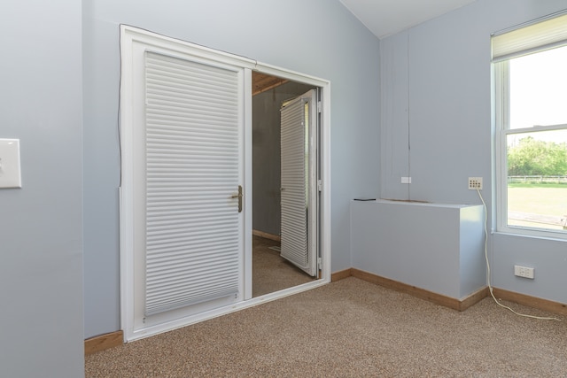 unfurnished bedroom featuring a closet and carpet