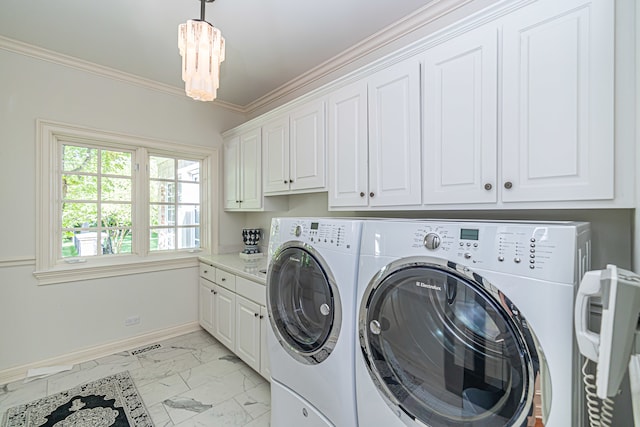 clothes washing area with washer and dryer, cabinets, ornamental molding, and light tile flooring