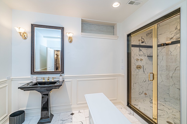 bathroom featuring tile flooring and an enclosed shower