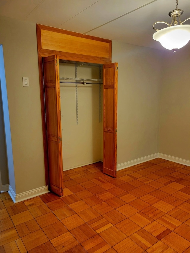 unfurnished bedroom with a closet