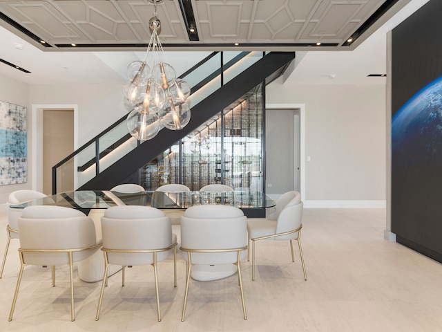 dining room featuring a notable chandelier